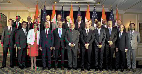 Prime Minister Narendra Modi pose for a group photograph with US business leaders at a meeting in Washington DC USA on Sunday. (Photo | PTI)