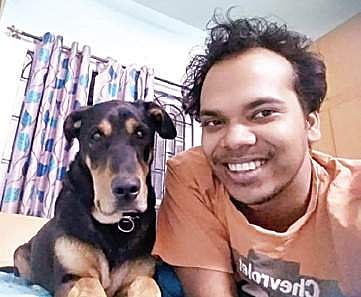 Mudit Dandwate with his pet dog