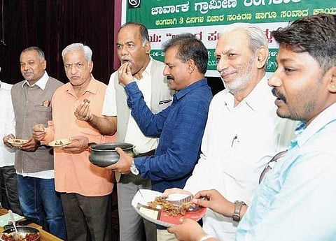 Prof Maheshchandra Guru, Prof K S Bhagwan and others inaugurated an interaction programme by eating beef in Mysuru on Sunday |Udayashankar S