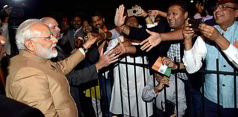 Prime Minister Narendra Modi being warmly welcomed by the people of Indian community on his arrival at Joint Base Andrews Washington DC USA on Sunday. | PTI