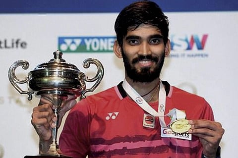 Shuttler Kidambi Srikanth poses with the trophy after winning the Australian Open Super Series title in Sydney on Sunday. | PTI