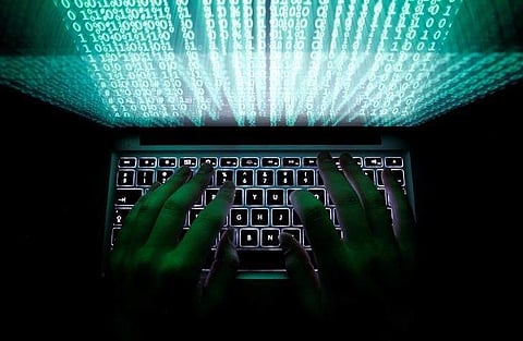 A man types on a computer keyboard in this illustration picture. (File Photo | Reuters)