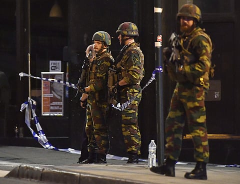 Belgian Army soldiers patrol in front of Central Station in Brussels after a reported explosion on Tuesday, June 20, 2017.(AP)