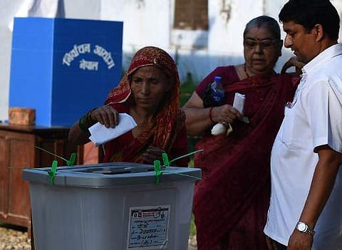 Nepalese voters casts their ballots at a polling station in Nepalgunj, some 510 kilometers south-west of Kathmandu on June 28, 2017. (Photo | AFP)