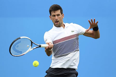 Serbia's Novak Djokovic plays a return during his pre-quarterfinal match against Canada's Vasek Pospisil, during day five of the AEGON International tennis tournament at Devonshire Park. | AP