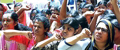 Members of United Nurses Association  taking out a protest march raising various demands including salary hike in front of the High Court  in Kochi on Wednesday  | K Shijith