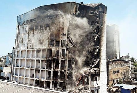 Remains of the Chennai Silks building being brought down on Saturday | Martin Louis