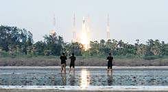 People looking on as GSLV MkIII is launched from the Satish Dhawan Space Research Centreat Sriharikotta on Monday.