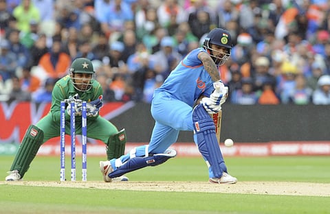 India's Shikhar Dhawan bats during the ICC Champions Trophy match between India and Pakistan at Edgbaston in Birmingham, England. | AP