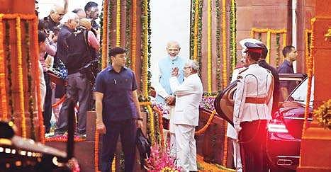 President Pranab Mukherjee bids adieu to the House as Prime Minister Narendra Modi looks on after the midnight launch of GST | SHEKHAR YADAV