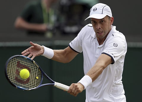 Luxembourg's Gilles Muller returns to Spain's Rafael Nadal during their Men's Singles Match on day seven at the Wimbledon. | AP