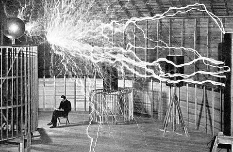 Nikola Tesla was a Serbian American inventor and engineer who discovered the rotating magnetic field. (Photo |  Century Magazine/ photographer Dickenson V. Alley via wikimedia commons)
