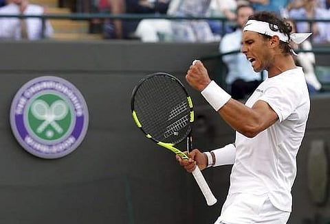 Spain's Rafael Nadal celebrates winning a point against Luxembourg's Gilles Muller during their Men's Singles Match on day seven at the Wimbledon. | AP