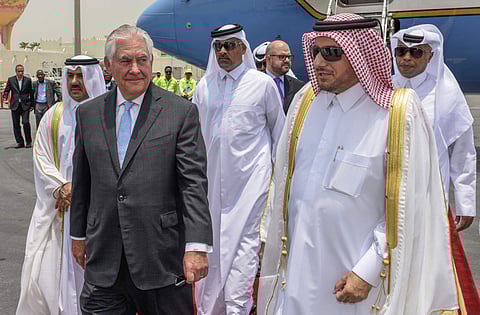 In this photo released by Qatar News Agency, U.S. Secretary of State Rex Tillerson arrives in Doha, Qatar, Tuesday, July 11, 2017. Tillerson arrived in Qatar as he tries to mediate a dispute between the energy-rich country and its Gulf neighbors. (Associa