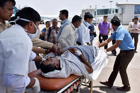 One of the Amarnath pilgrims, injured in the terror attack in Jammu and Kashmir, after being brought to the Surat airport in an IAF plane on Tuesday | PTI