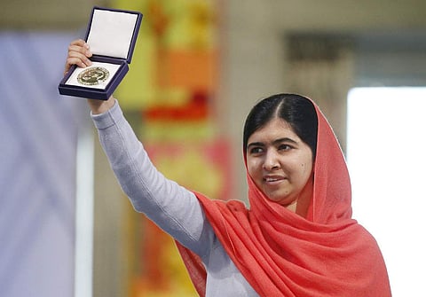In 2014, Malala shared Nobel  Peace Prize with  Kailash Satyarthi, the Indian child rights activist. She is the youngest person to  receive the award. | AP