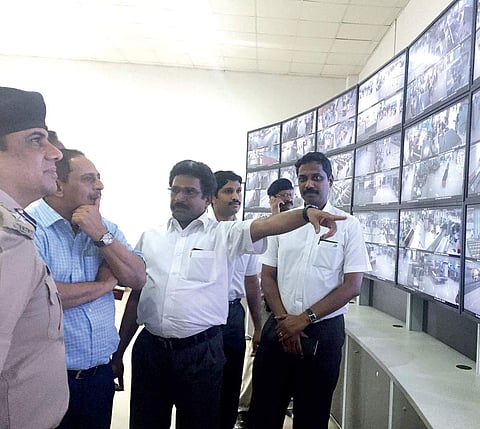 Airport Director A C K Nair explaining the functioning of the new security control centre to CIAL  managing director V J Kurian, who inaugurated the project on Wednesday