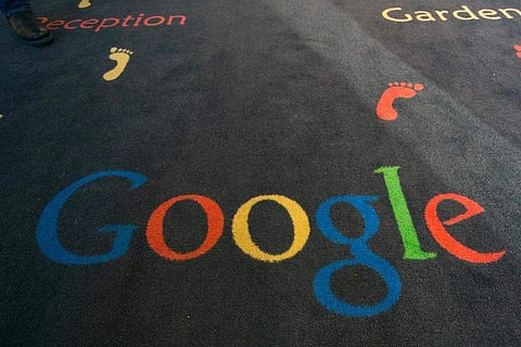This Dec. 10, 2013 file photo shows the Google logo printed on a carpet during the inauguration of the new Google cultural institute in Paris, France. (AP)