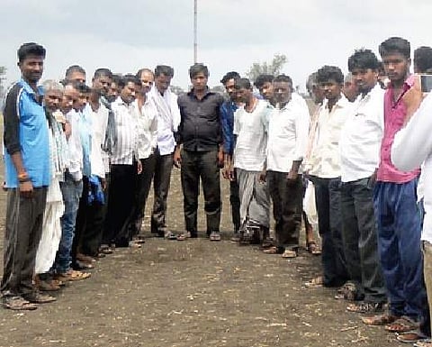 Villagers at the area where footprints  of a white creature were spotted
