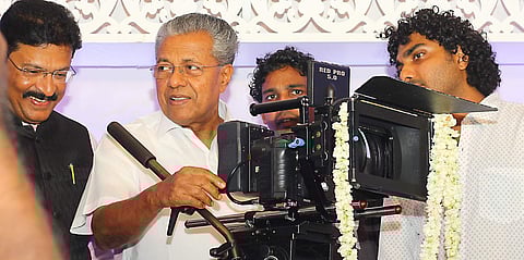 Kerala Chief Minister Pinarayi Vijayan graced the pooja ceremony of debutante Shravan Mukesh's film 'Kalyanam'. The budding actor is the son of estranged actors Mukesh and Saritha.   (Photo: Kaviyoor Santhosh | Express Photo Service)