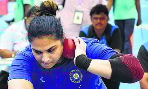 Shot put gold medal winner Manpreet Kaur in action on Saturday. (P Ravindra Babu | EPS)