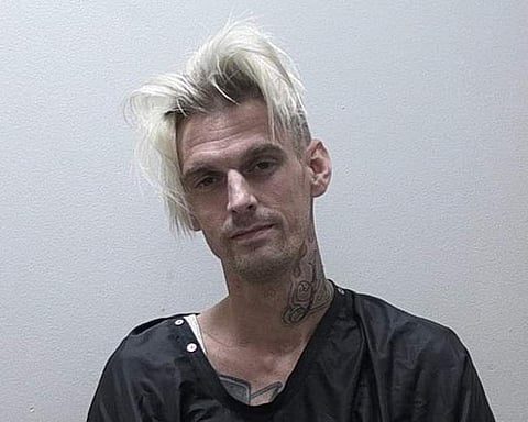 This undated photo provided by the Habersham County Sheriff's Office shows Aaron Carter. Authorities say singer Aaron Carter and his girlfriend have been arrested on DUI and drug charges in Georgia. Habersham County Sheriff's Office spokesman Capt. Floyd 