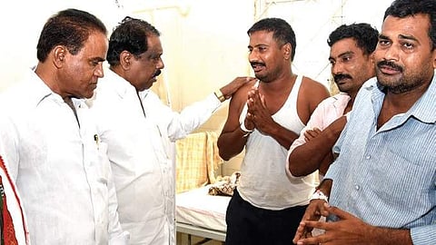 Congress leaders consoling victims in Karimnagar on Monday | express