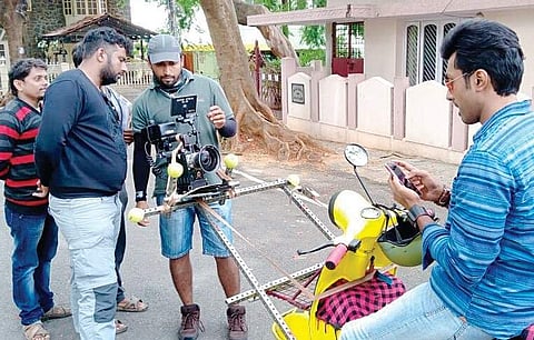 Cinematographer Abhishek Kasargod with the director and team