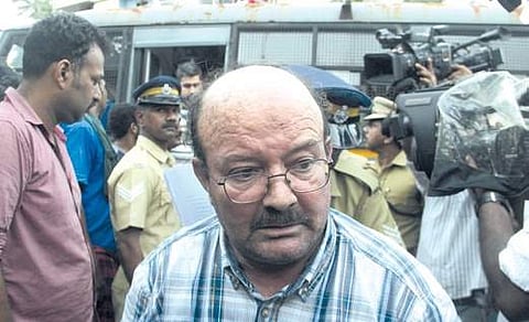 Police producing Geogiannakis Ioannis master of MV Amber L with two other accused at the First Class Majistrate Court,Thoppumpady in Kochi on Saturday | Melton Antony