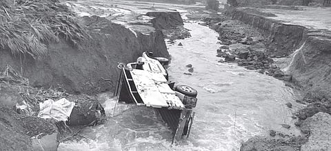 A view of the road which was washed away near Kankumbi in Khanapur taluk, following heavy rains