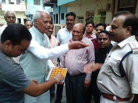 Ram Swaroop Kovind celebrates by distributing sweets on his younger brother Ram Nath Kovind becoming the President of India.