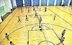 Children receiving badminton coaching at the KSFL - Tenvic Sports Coaching Academy