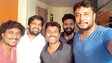 Director Pavan Wadeyar, Sandesh N and Darshan along with the team