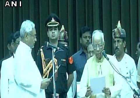 Nitish Kumar taking oath as the chief minister hours after resigning from the post in Patna on Thursday. (ANI)