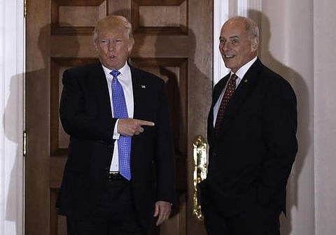  President-elect Donald Trump talks to media as he stands with retired Marine Gen. John Kelly. (File | AP)