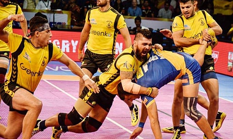 Kabaddi match between Telugu Titans yello jersy vs Tamil Talaivas at Gachibowli stadium in Hyderabad. (Vinay Madapu | EPS)
