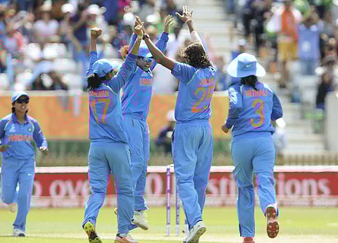 Derby Indian cricketers celebrate with teammate Jhulan Goswami second right the dismissal of Pakistan's Javeria Wadood during the ICC Women's World Cup 2017 match between India and Pakistan at County Ground in Derby England on Sunday. | AP