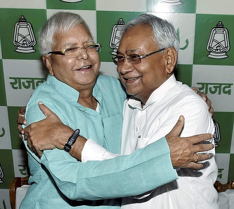 Bihar Chief Minister Nitish Kumar with RJD Chief Lalu Prasad Yadav on his 70th birthday. (File | PTI)