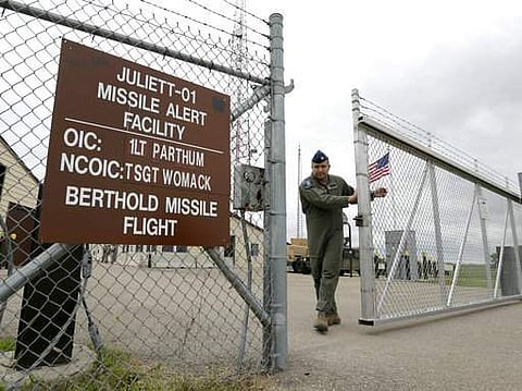 In this June 24, 2014 file photo, a gate is closed at an ICBM launch control facility in the countryside outside Minot, N.D., on the Minot Air Force Base. The Pentagon has thrown a cloak of official secrecy over assessments of how safely and securely its 