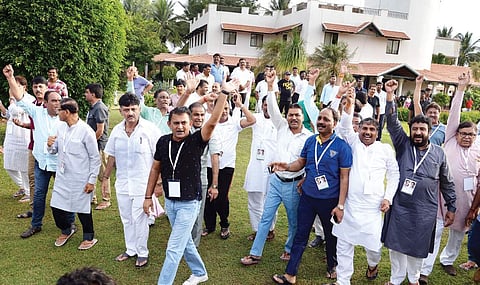 Energy Minister D K Shivakumar along with Gujarat Congress MLAs at the Eagleton Resort near Bengaluru on Sunday I Express Photo Service