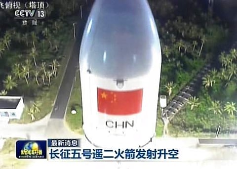 In this image taken from a video footage run by China's CCTV via AP Video, a Long March 5 rocket lifts off from the Wenchang Space Launch Center in southern China's Hainan province on Sunday, July 2, 2017. (File | AP)