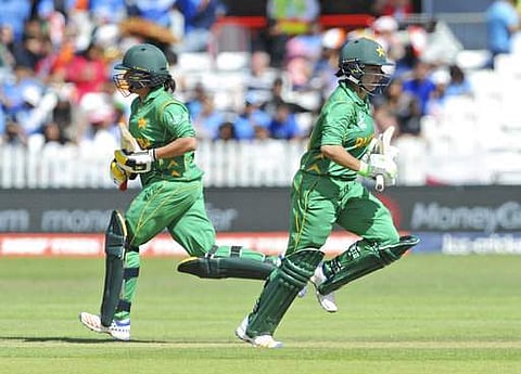 Pakistan's Bibi Nahida , right, and Sana Mir take a run during the ICC Women's World Cup 2017 match (AP Photo/Rui Vieira)