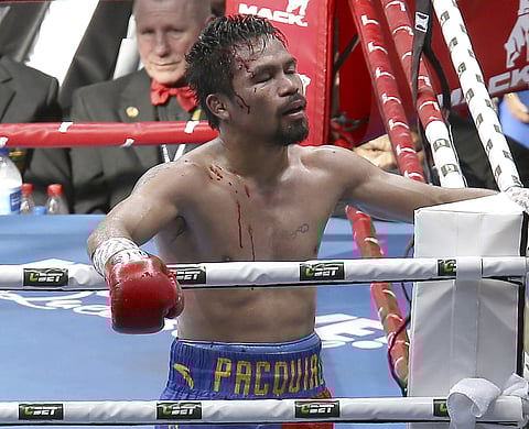 Manny Pacquiao of the Philippines reacts after his loss to Jeff Horn of Australia, during their WBO World Welterweight title fight in Brisbane, Australia. | AP