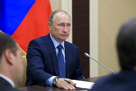 Russian President Vladimir Putin chairs a meeting of the Council for Strategic Development and Priority Projects in the Novo-Ogaryovo residence outside Moscow, Russia, Wednesday, July 5, 2017. (Alexei Druzhinin/Pool Photo via AP)