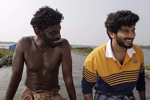 Vinayakan and Dulquer Salmaan in 'Kammattipaadam'. (Photo  Facebook)