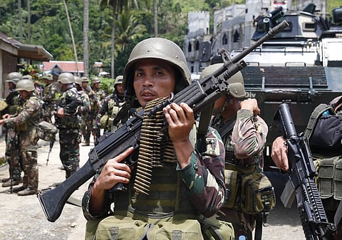 Government troops prepare to head to the frontline as fighting with Abu Sayyaf (File | AP)