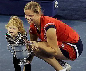 Kim Clijsters, of Belgium, with her 18-month-old daughter Jada after winning the women's championship at the US Open in 2009. | AP