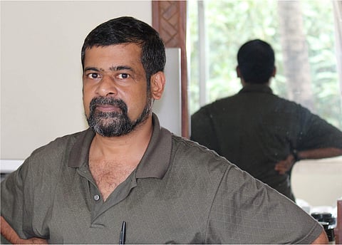 Writer, poet Vijay Nambisan. (Photo  | Paperwall)