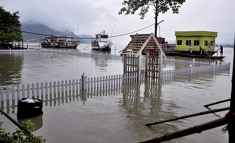 Pir Ajan Fakir Udyan at Machkhowa submerged by flooded river Brahmaputra in Guwahati on Sunday. | PTI