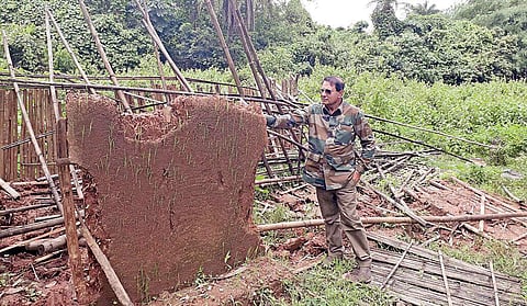 Nawab Shafat Ali Khan, sharp shooter from Hyderabad at a house damaged by elephant in Jharkhand | Express photo